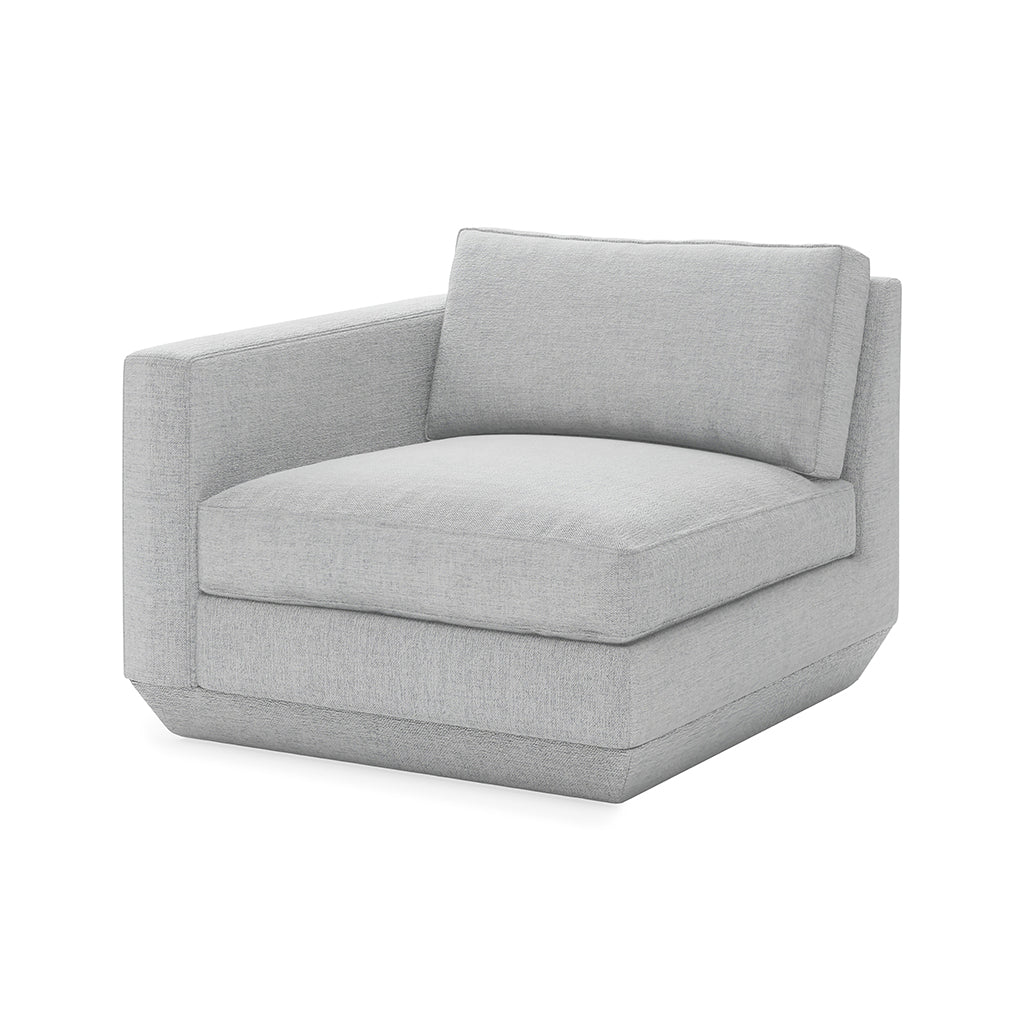 Modern gray upholstered armchair with clean lines and plush cushioning