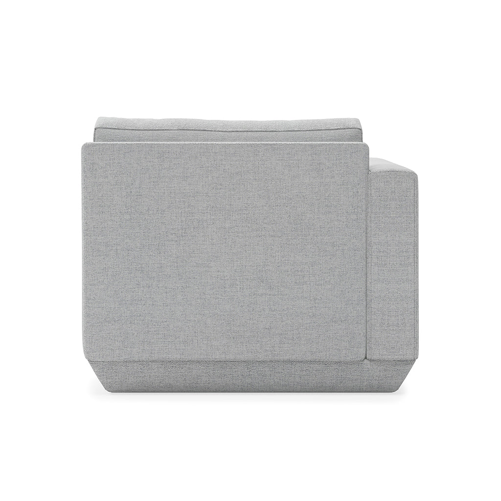 Gray linen armchair with clean lines and modern silhouette