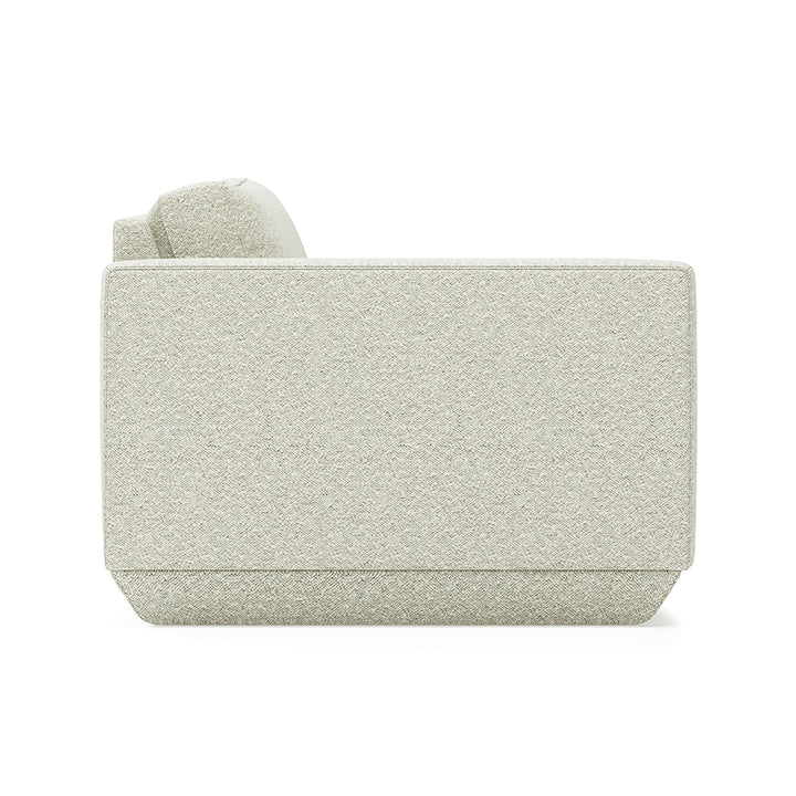 Elegant beige upholstered sofa with minimalist design and textured fabric