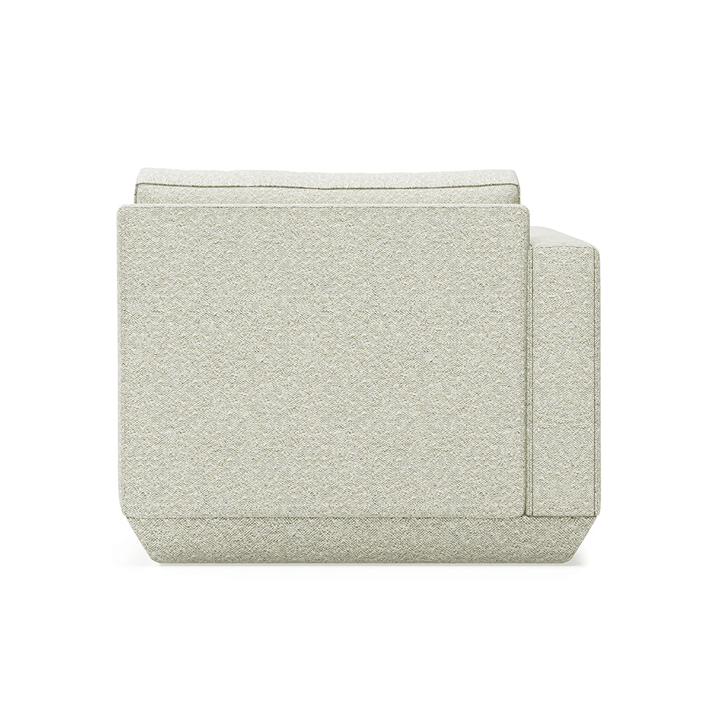Elegant linen-upholstered armchair with clean lines and modern design