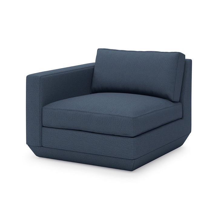 Navy blue modern armchair with clean lines and plush upholstery