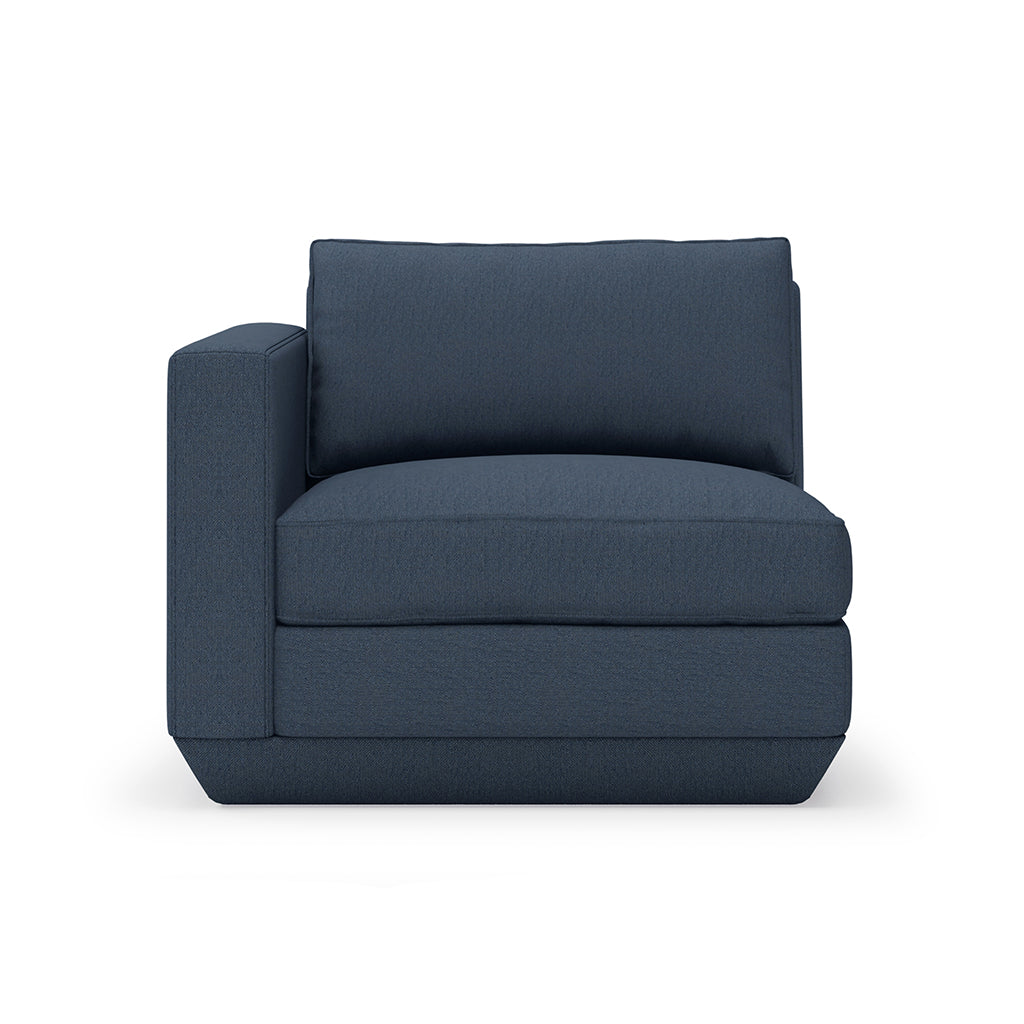 Navy linen armchair with clean lines and modern silhouette