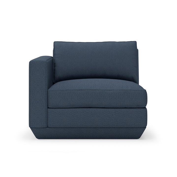Navy linen armchair with clean lines and modern silhouette