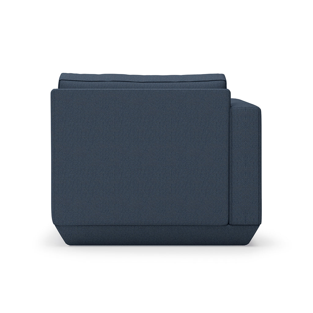 Navy linen armchair with clean lines and modern silhouette