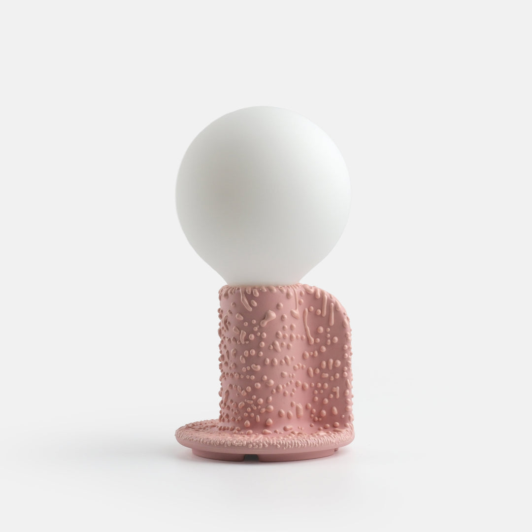 Pink textured ceramic lamp with matte white globe, modern designer home decor