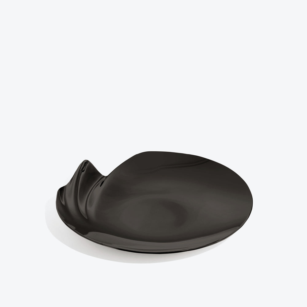 Serenity Platter — medium black platter, three-quarter view of the curling rippled edge on a white background
