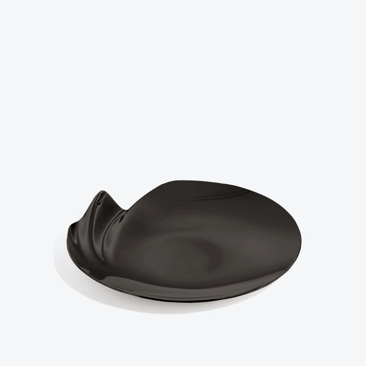 Serenity Platter — medium black platter, three-quarter view of the curling rippled edge on a white background