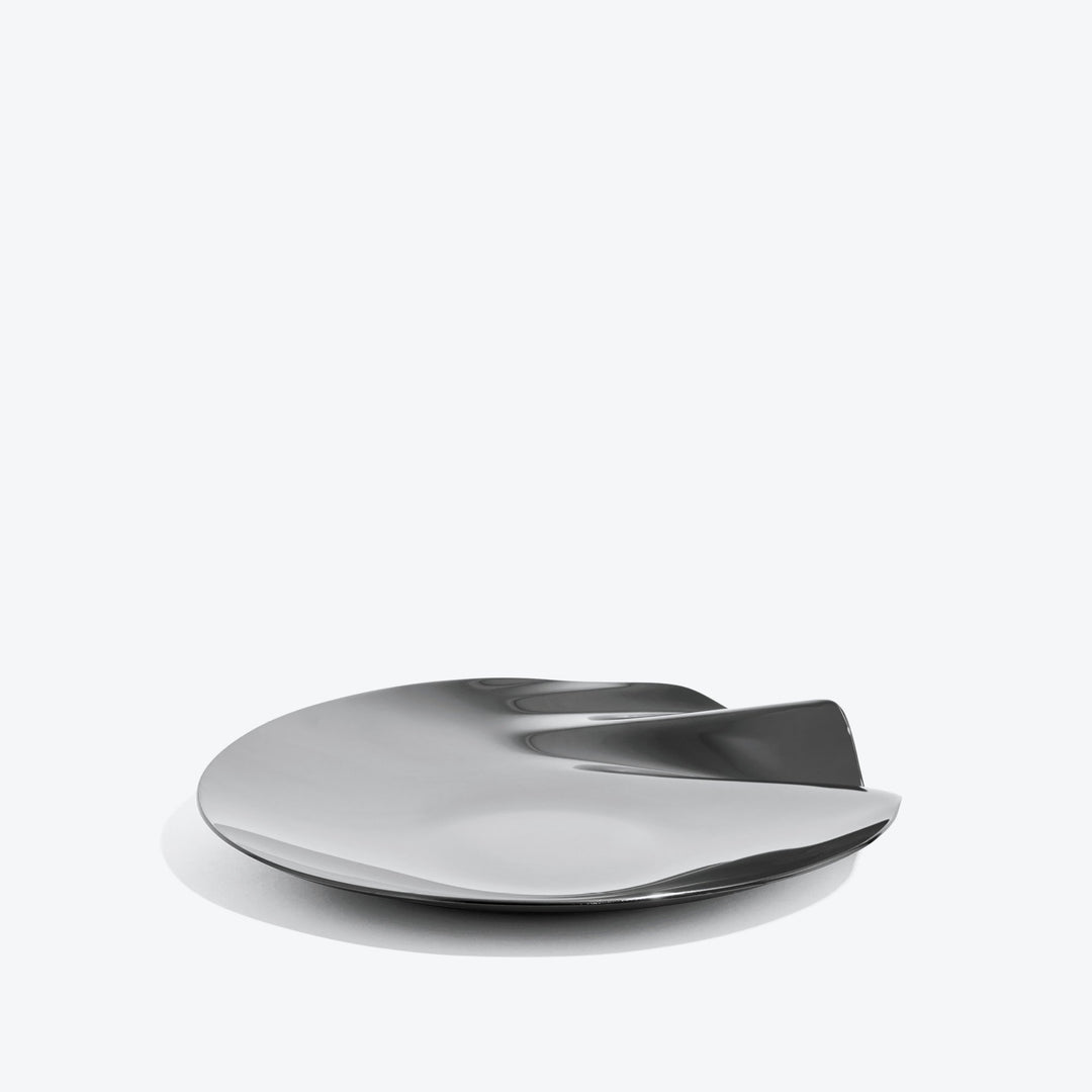 Serenity Platter — medium silver platter, low side view of the rippled edge on a white background