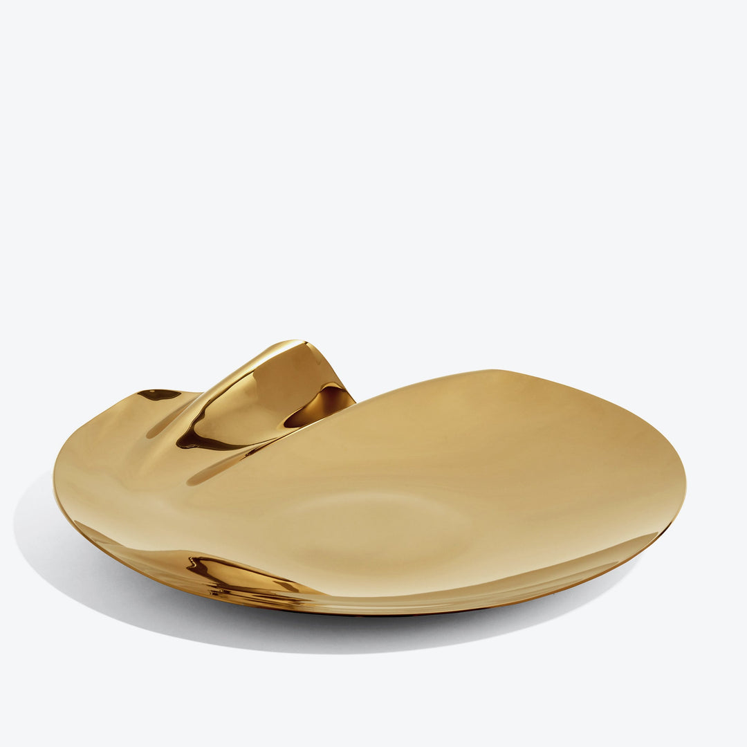 Serenity Platter — large gold platter, three-quarter view of the rippled edge on a white background