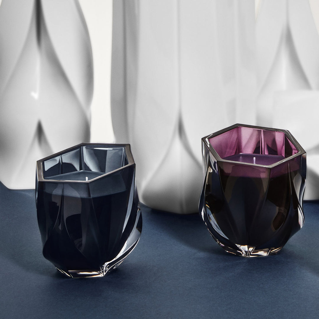 Shimmer Scented Candle — Slate Blue and Purple candles on a navy surface against white sculpted vases