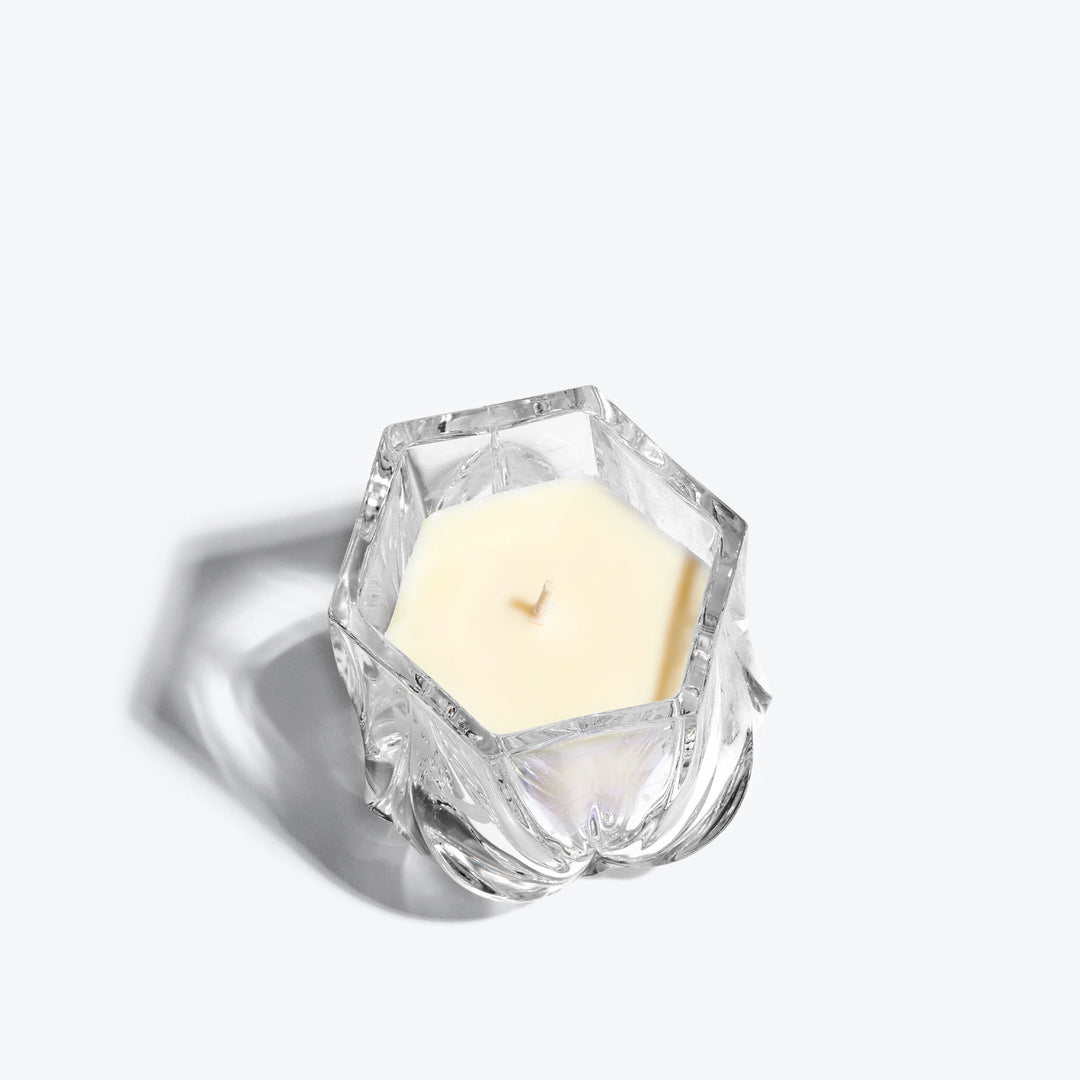 Shimmer Scented Candle — Clear crystal vessel, top-down view of hexagonal rim and wick