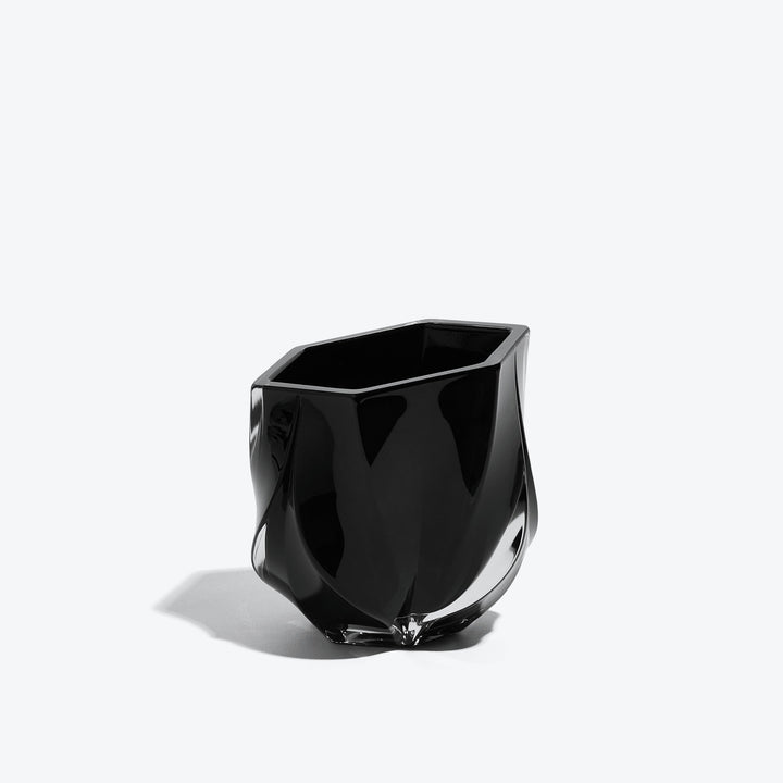Shimmer Scented Candle — glossy black glass vessel with twisted facets, side view