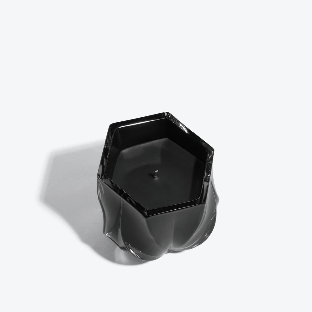 Shimmer Scented Candle — glossy black glass vessel, top-down view of hexagonal rim