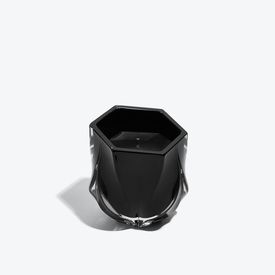 Shimmer Scented Candle — glossy black glass vessel, three-quarter view