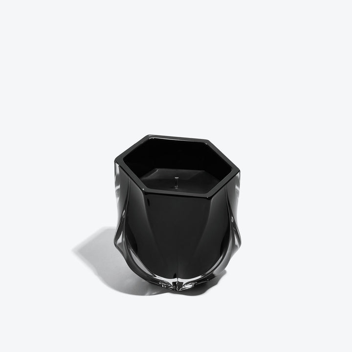Shimmer Scented Candle — glossy black glass vessel, three-quarter view