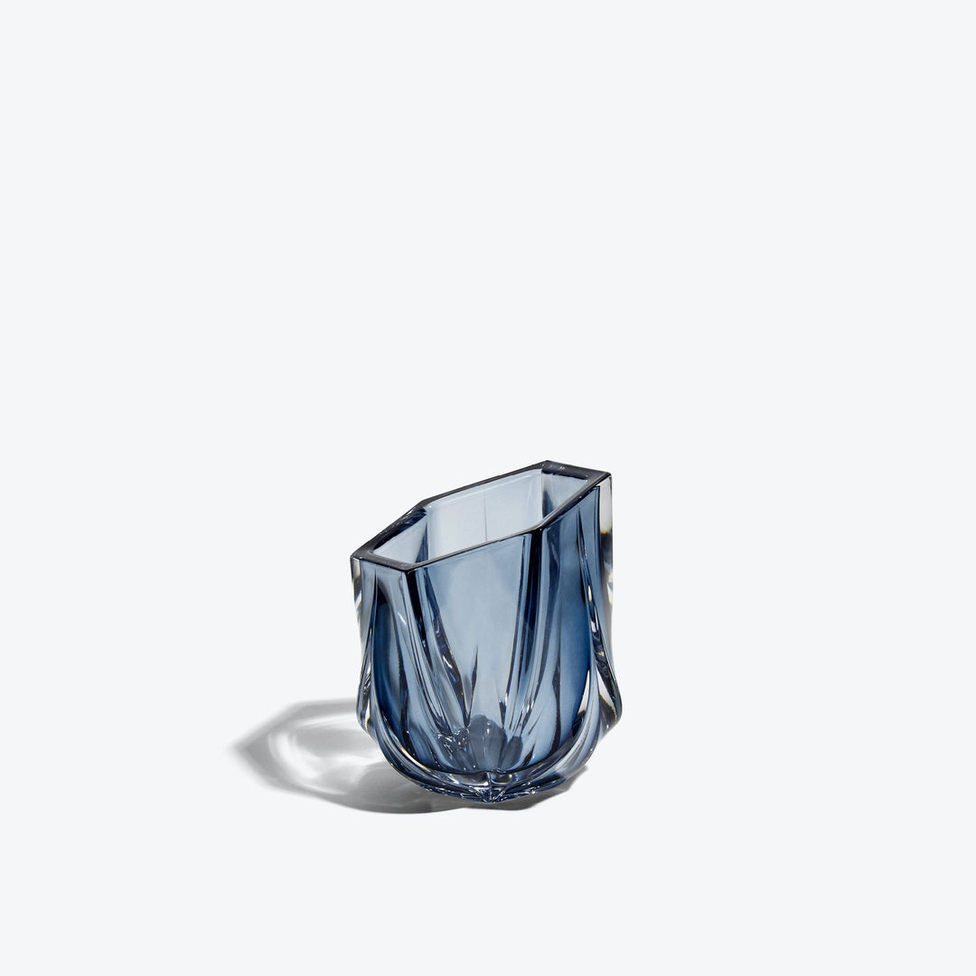 Shimmer Tealight Holder — Slate Blue faceted glass holder, three-quarter side view on white
