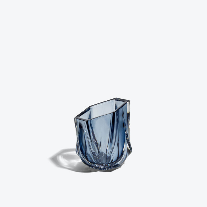 Shimmer Tealight Holder — Slate Blue faceted glass holder, three-quarter side view on white