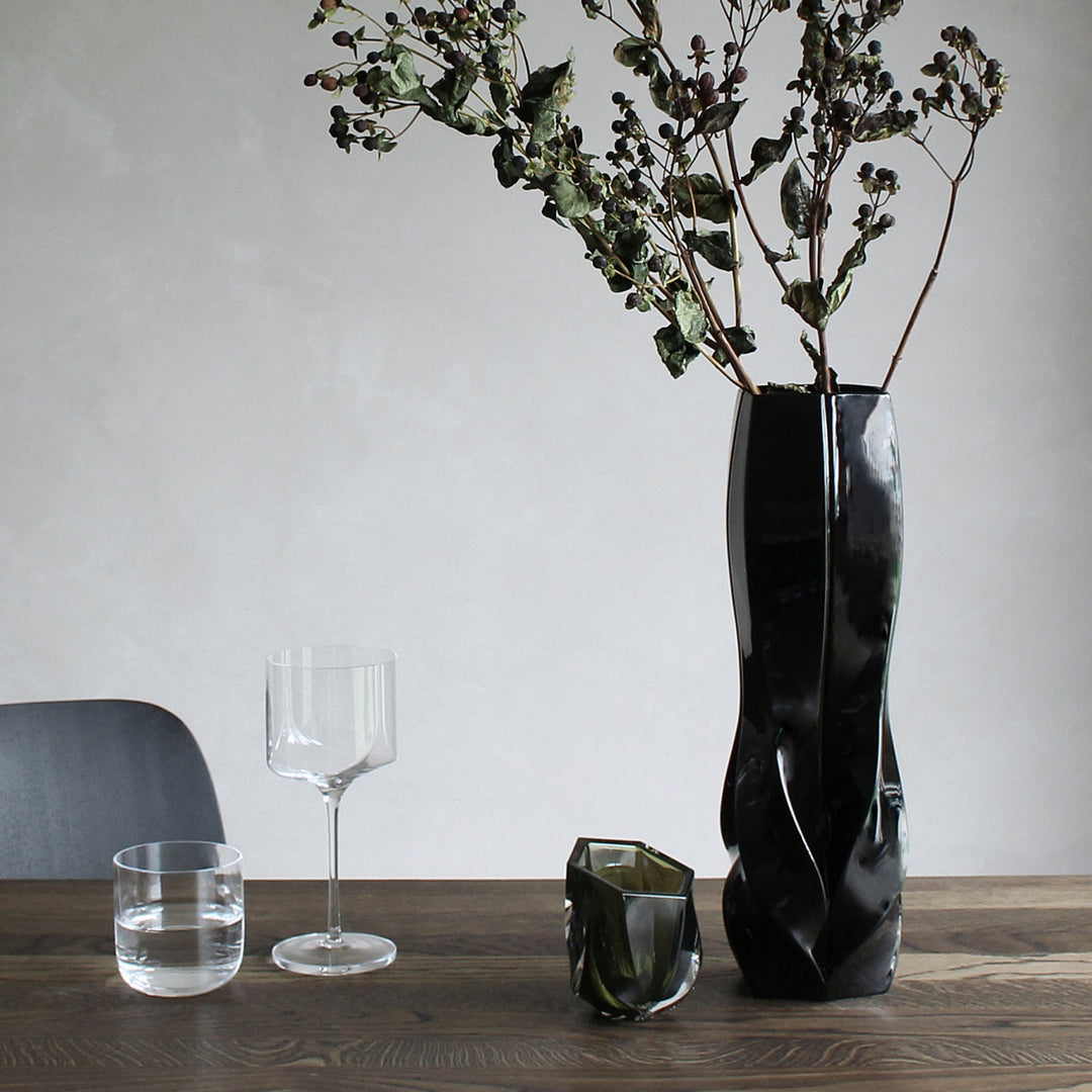 Braid Vase — black Waist vase with dried branches on a wooden dining table beside glassware