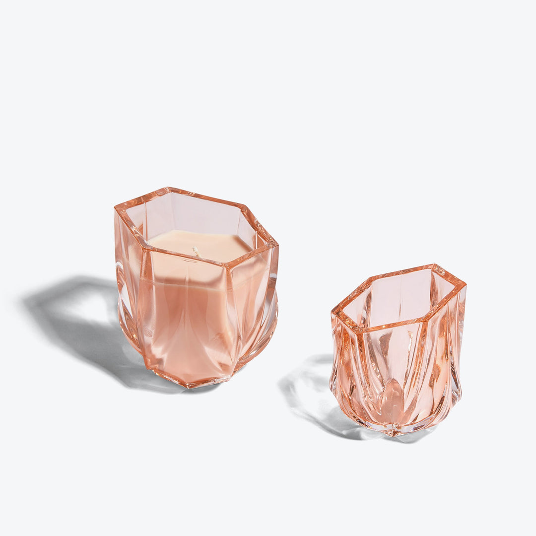 Shimmer Tealight Holder — Rose holder beside a larger rose glass candle, packshot on white