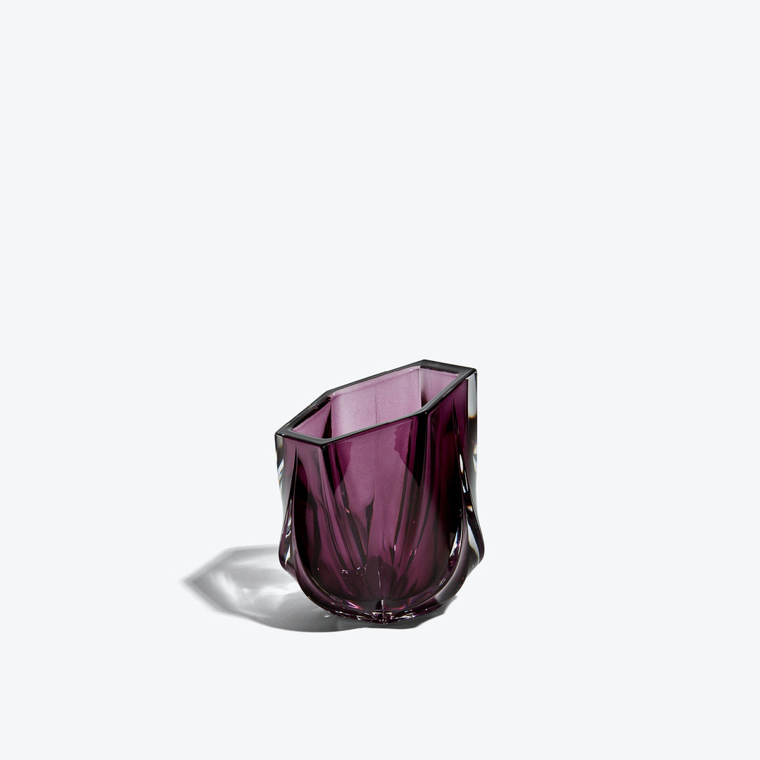 Shimmer Tealight Holder — Purple faceted glass holder, three-quarter side view on white