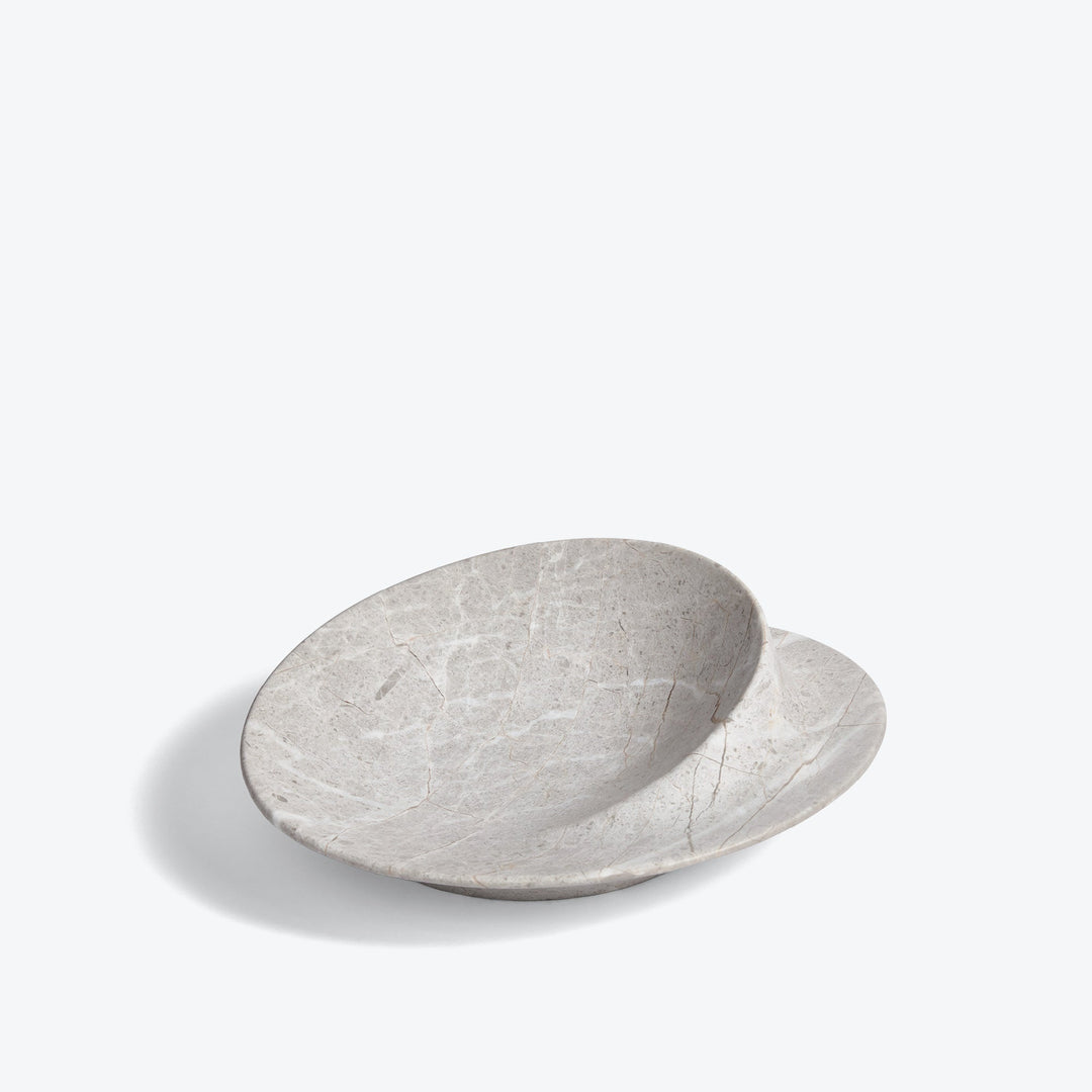 Swirl Bowl — small Grey Marble bowl showing the swirl interior, three-quarter view