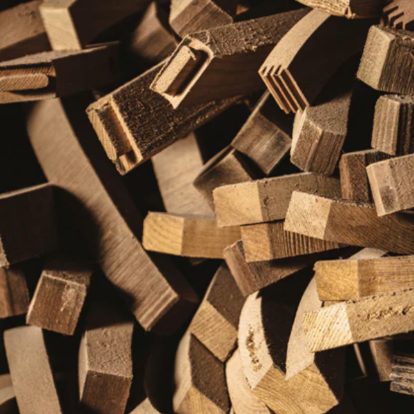 Artisan-crafted wooden furniture components, showcasing rich grain and precise joinery for premium home design.