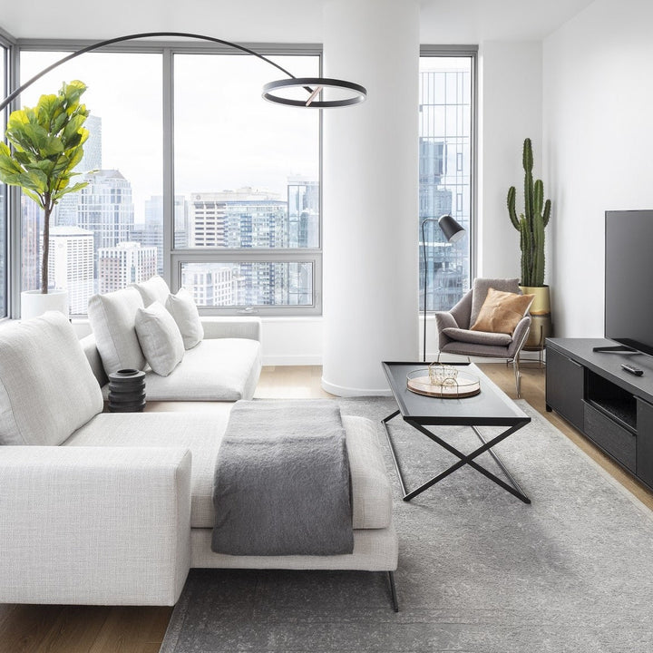 Sol Mega Floor Lamp by Seed Design, styled in a room setting, view 8
