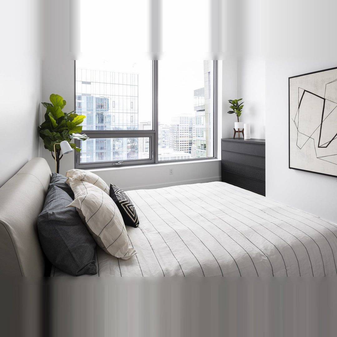 Dobi Table Lamp by Seed Design, styled in a room setting, view 5