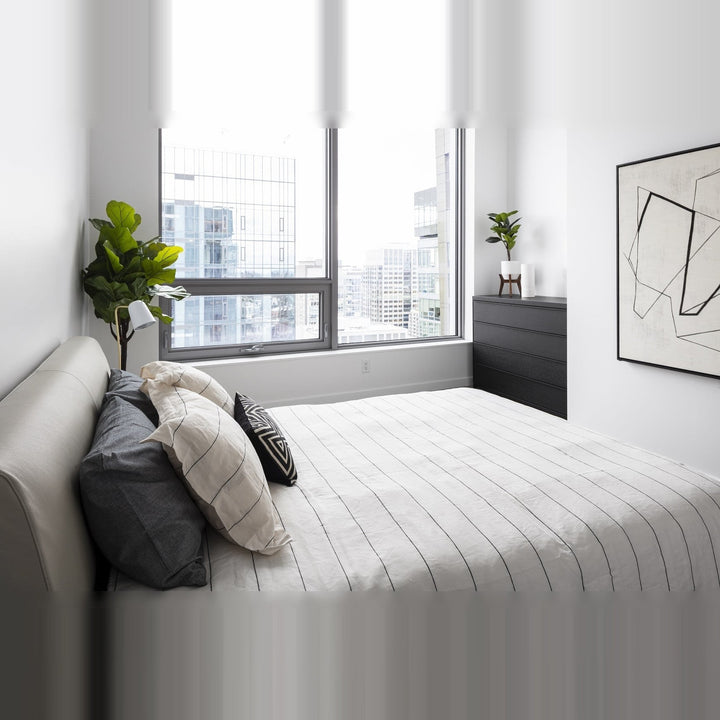 Dobi Table Lamp by Seed Design, styled in a room setting, view 5