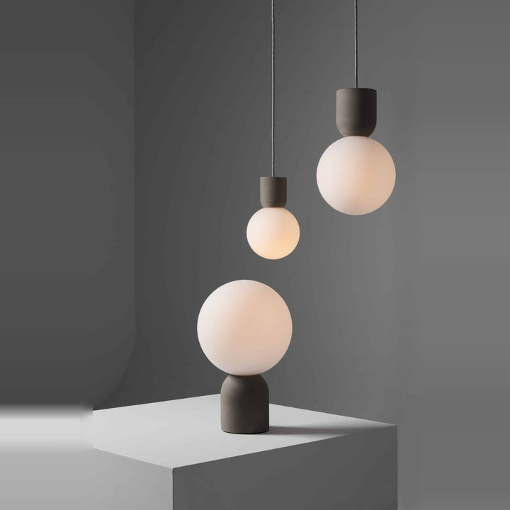 Castle Glo Table Lamp by Seed Design, styled in a room setting
