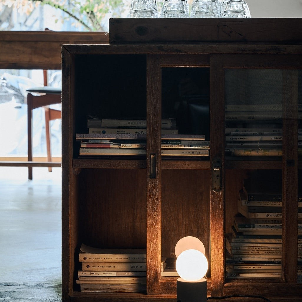 Castle Muse Table Lamp by Seed Design, styled in a room setting