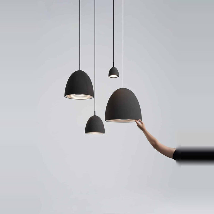 Castle Noir Pendant by Seed Design, styled in a room setting