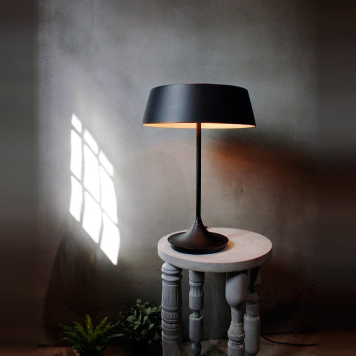 China Table Lamp by Seed Design, styled in a room setting
