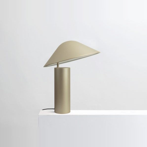 Damo Simple Table Lamp by Seed Design in Champagne Gold, styled in a room setting
