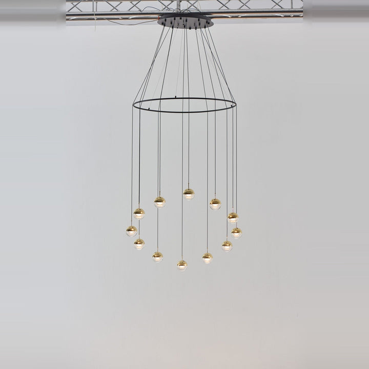 Dora Pendant P12 by Seed Design in Brass / With Ring, styled in a room setting