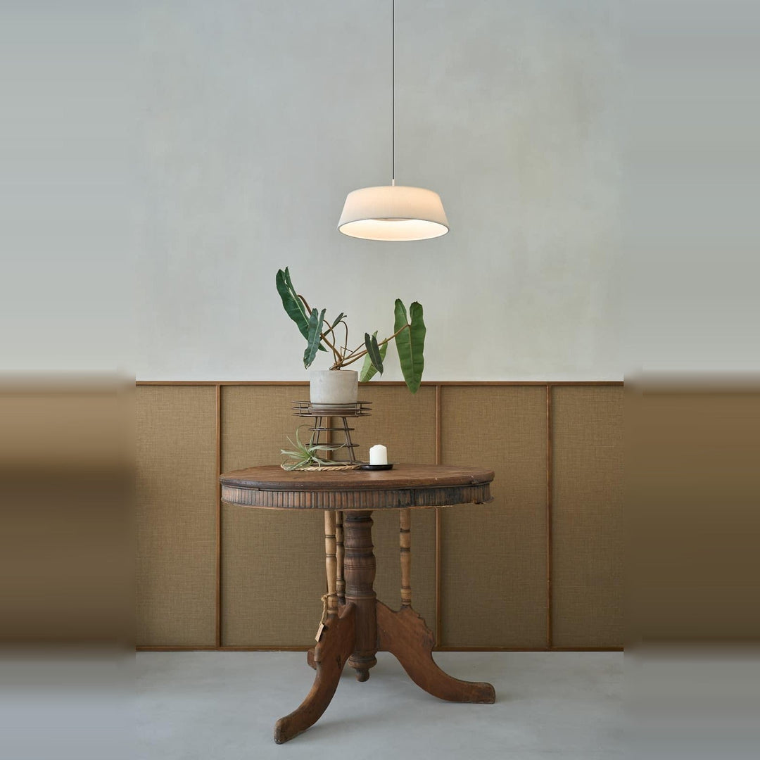 Halo Pendant by Seed Design in White, styled in a room setting