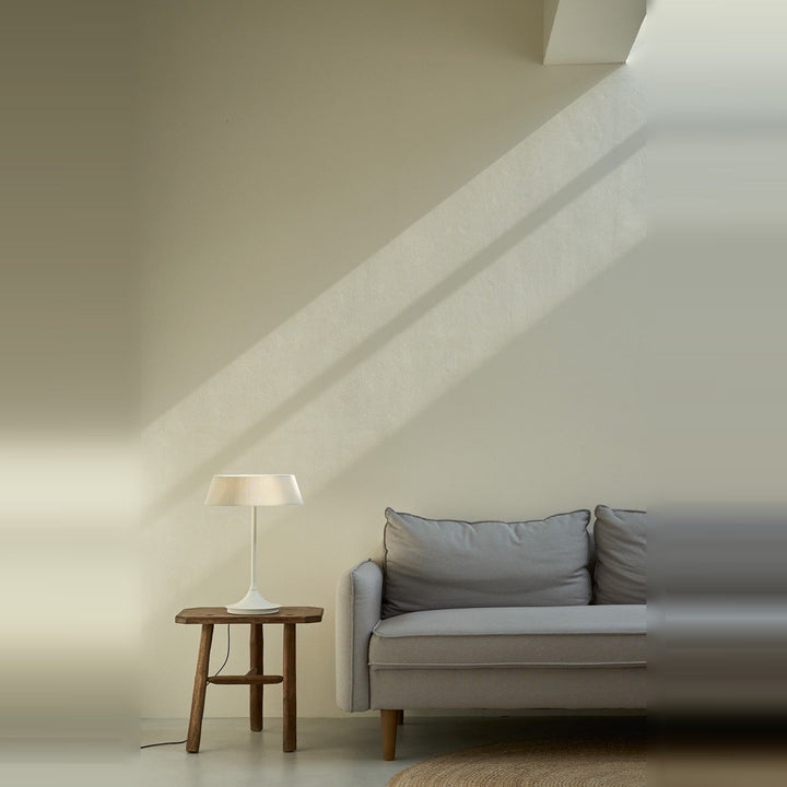 Halo Table Lamp by Seed Design, styled in a room setting, view 3