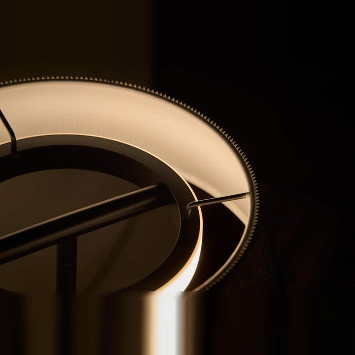 Halo Wall Sconce by Seed Design, styled in a room setting