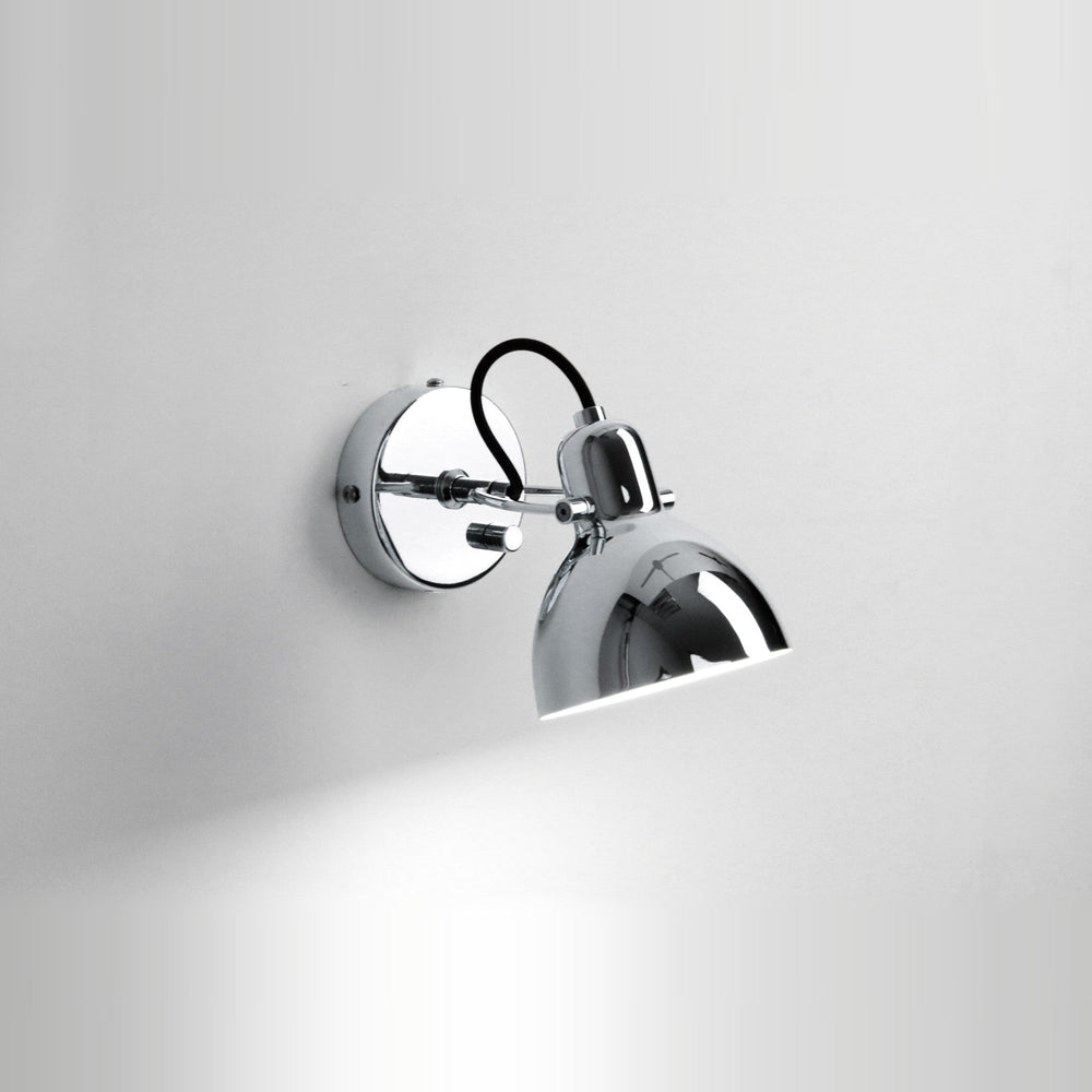 Laito Mini Wall Sconce by Seed Design in Chrome, styled in a room setting