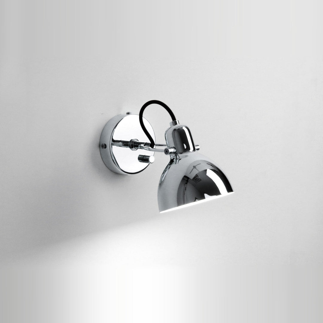 Laito Mini Wall Sconce by Seed Design in Chrome, styled in a room setting