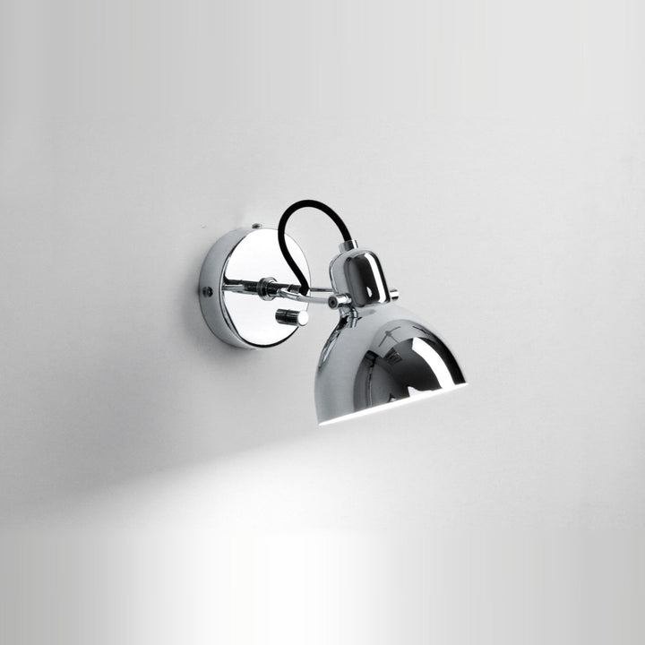 Laito Mini Wall Sconce by Seed Design in Chrome, styled in a room setting
