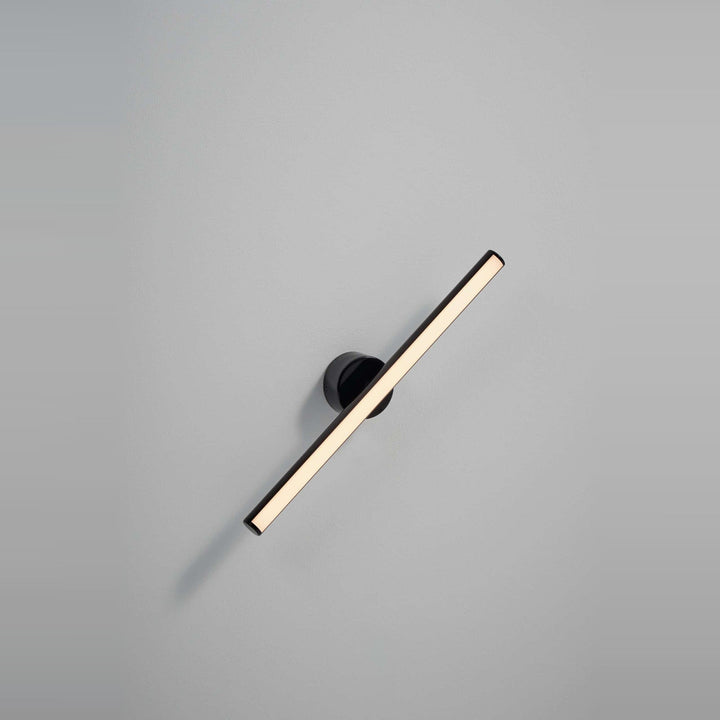 Lisa Wall Sconce by Seed Design in Black, studio shot