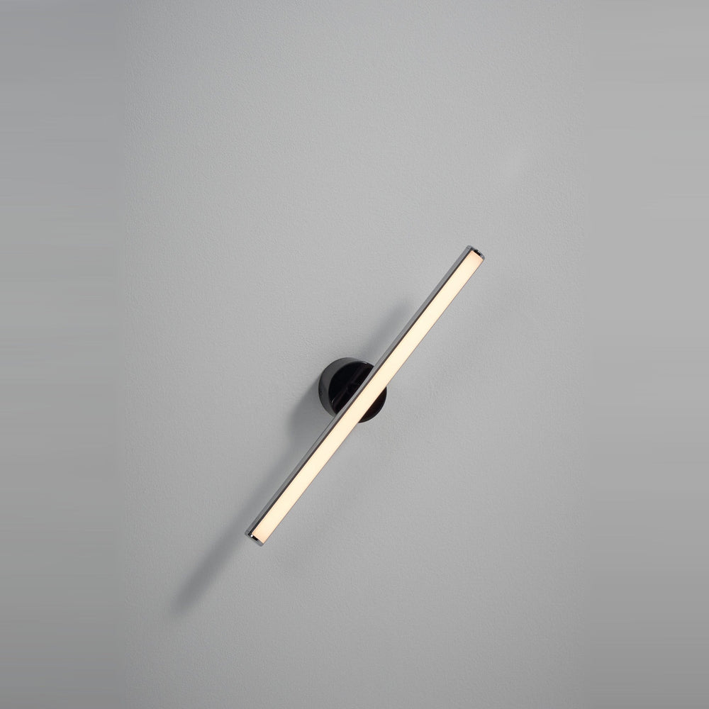 Lisa Wall Sconce by Seed Design in Chrome, styled in a room setting