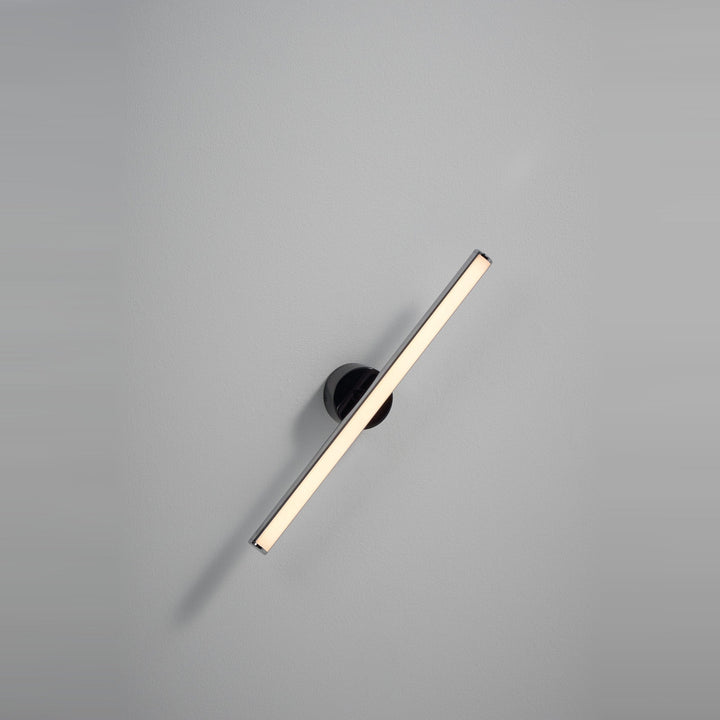 Lisa Wall Sconce by Seed Design in Chrome, styled in a room setting