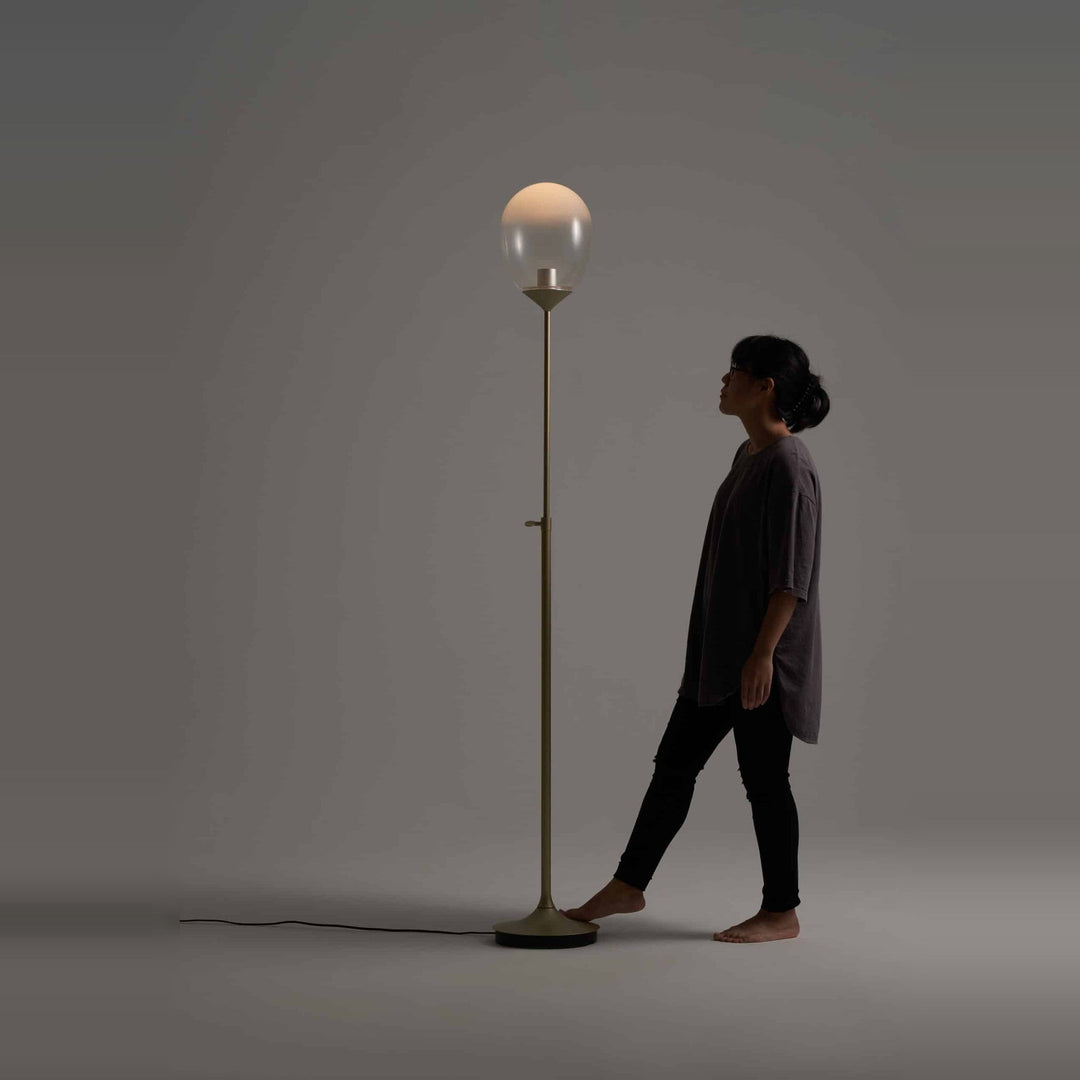 Mist LED Floor Lamp by Seed Design, styled in a room setting, view 3
