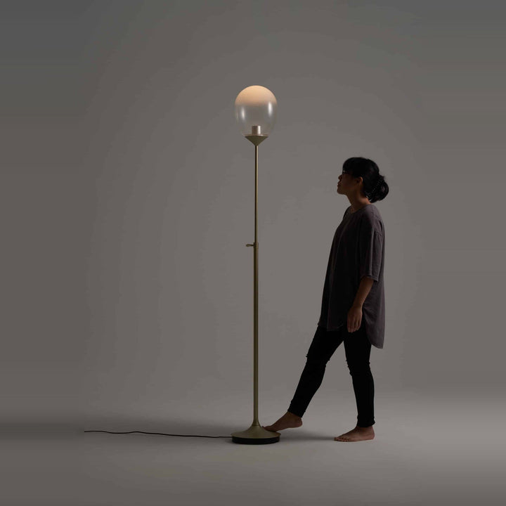 Mist LED Floor Lamp by Seed Design, styled in a room setting, view 3