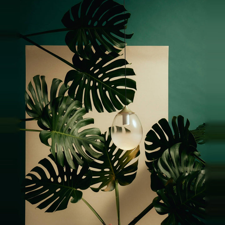 Mist LED Pendant by Seed Design, styled in a room setting, view 2