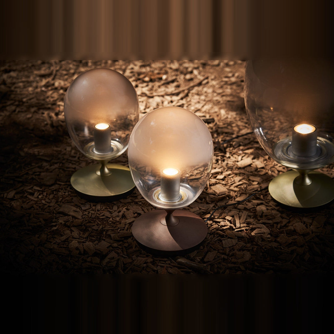 Mist LED Table Lamp by Seed Design, styled in a room setting, view 4