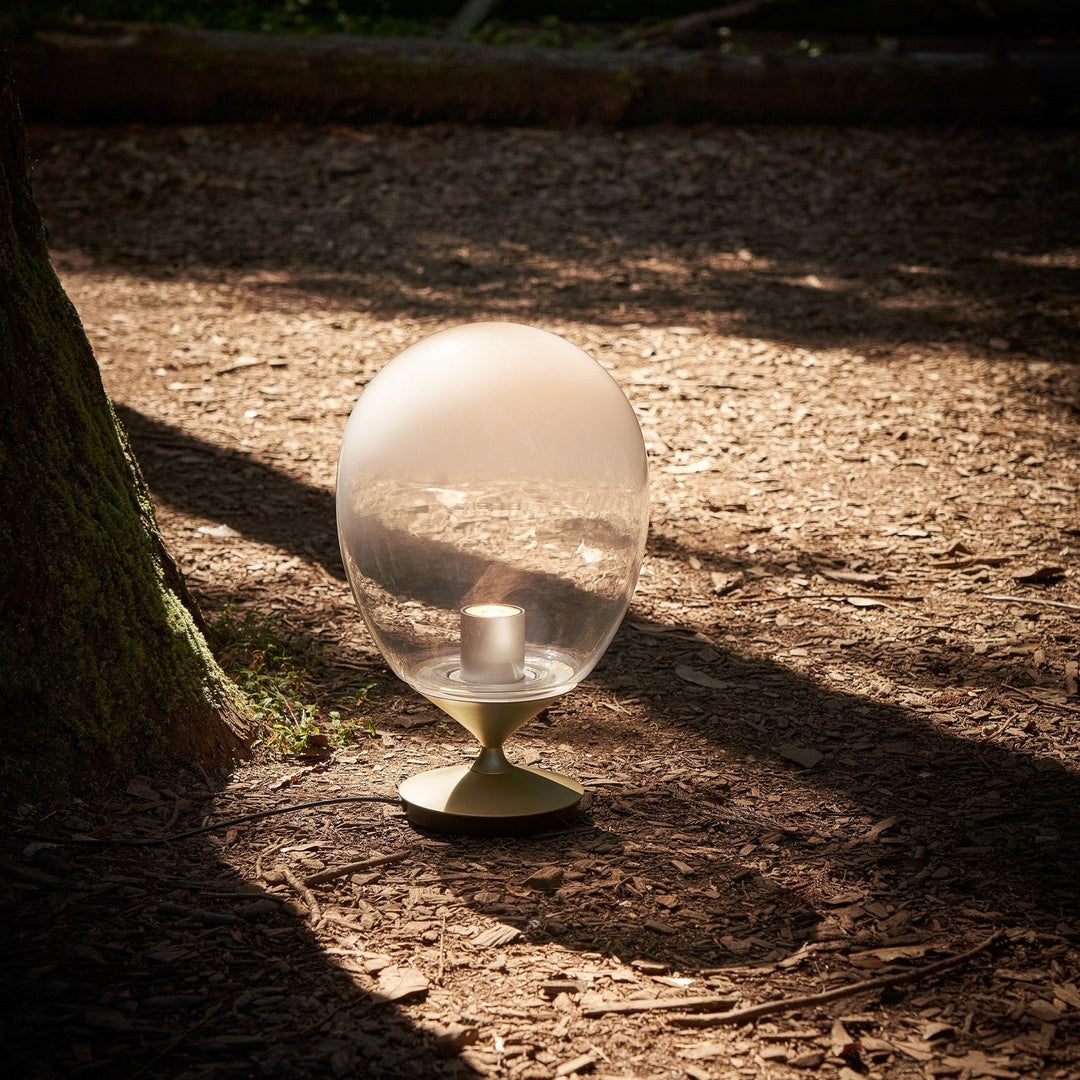 Mist LED Table Lamp by Seed Design, styled in a room setting, view 2
