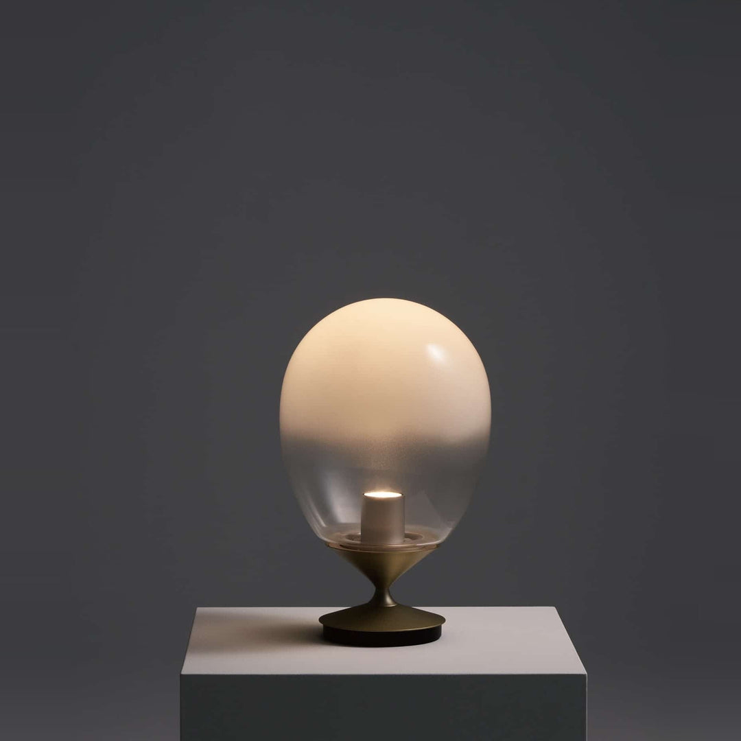 Mist LED Table Lamp by Seed Design, styled in a room setting, view 8